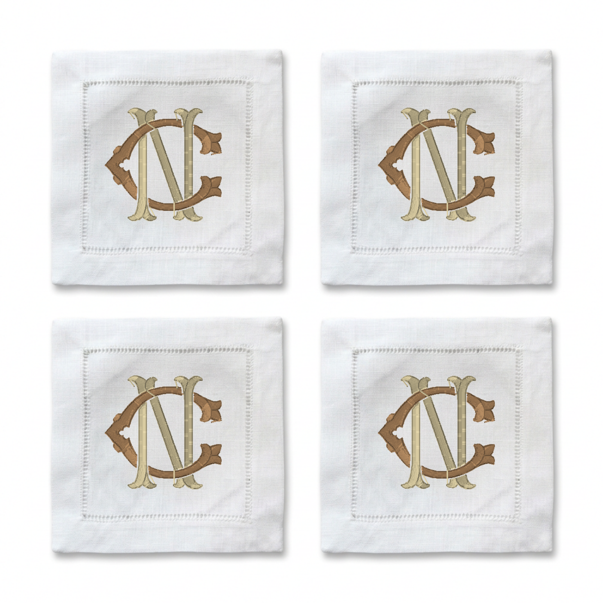 Four white square napkins arranged in a 2x2 grid, each featuring an embroidered monogram design in beige and brown.